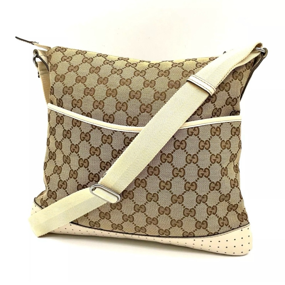 SOLD!!!!!! Gucci GG Canvas Perforated Calfskin Messenger Crossbody